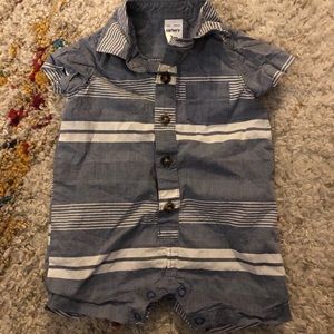Baby boy blue and white striped romper.